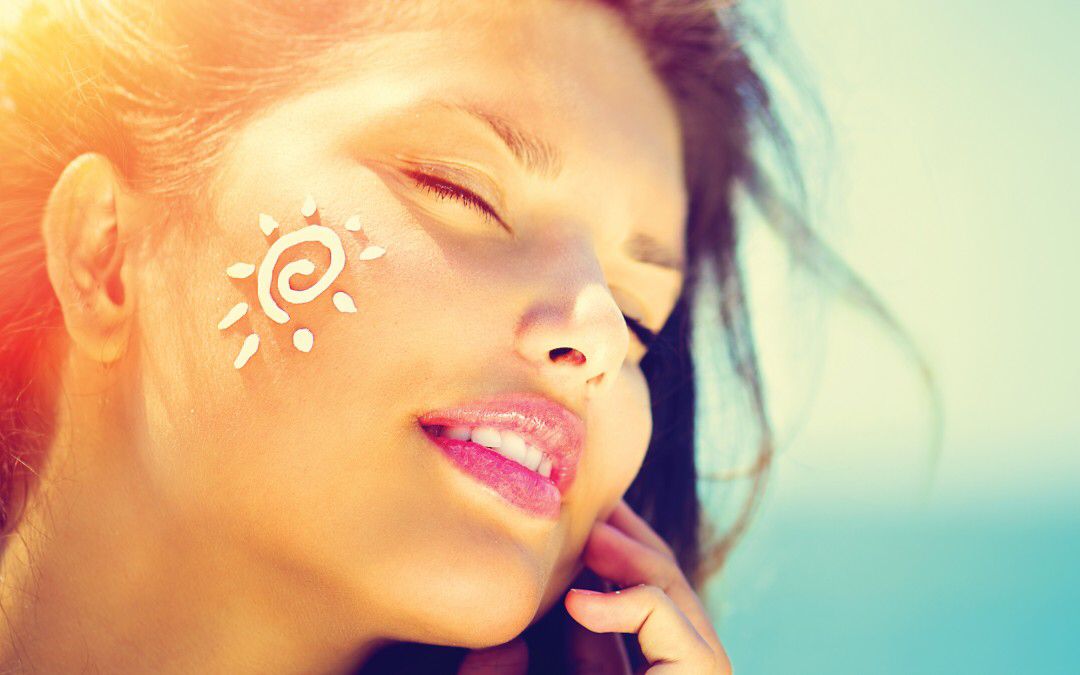 Come preparare la pelle del viso al sole